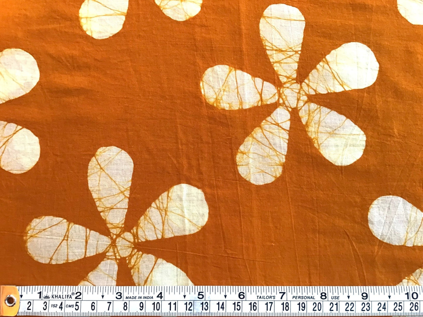 Orange separated flower shapes Batik Hand Printed Pure Cotton Fabric - Violet Elizabeth - Haberdashery