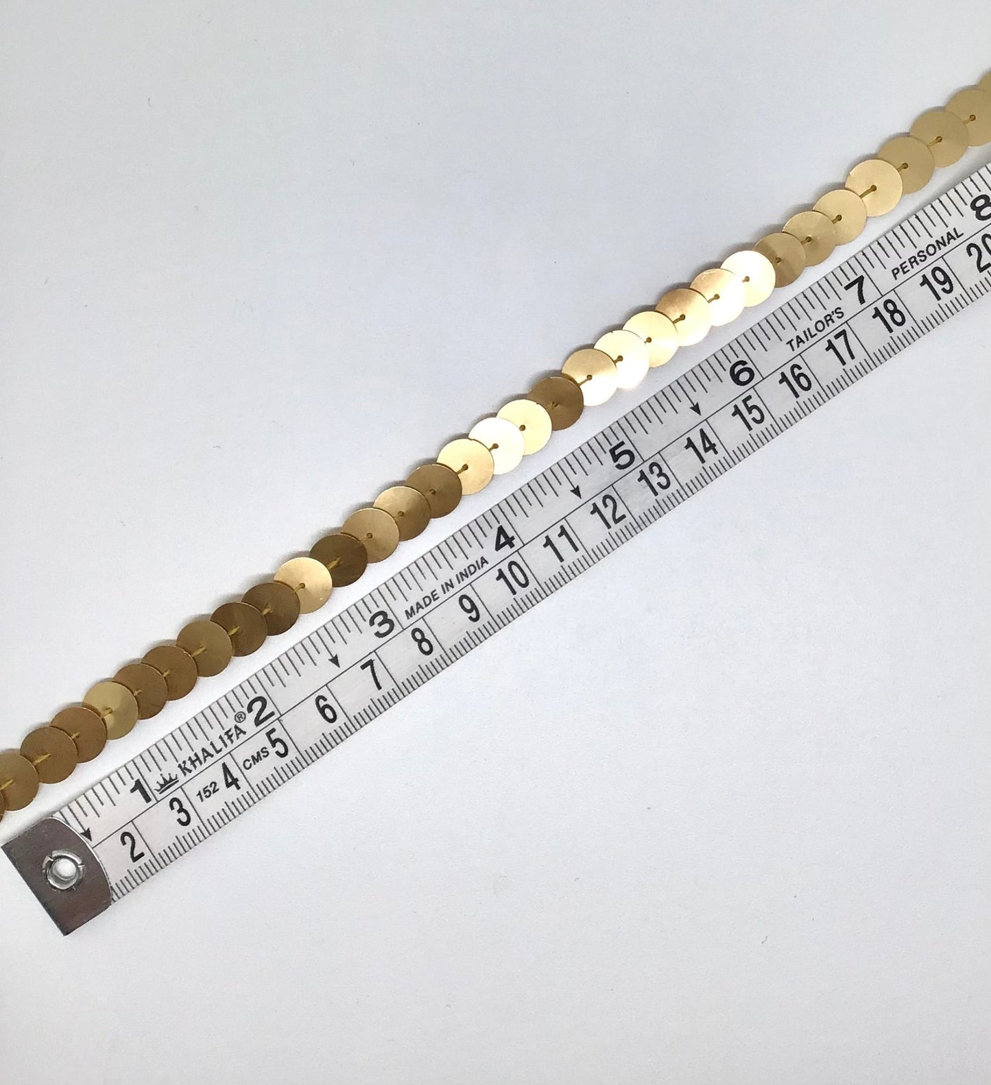10 mm gold sequins in a continuous line - Violet Elizabeth - Haberdashery