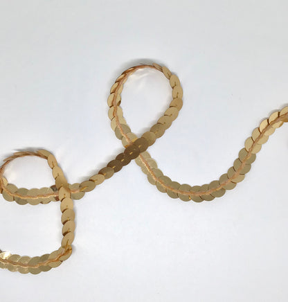 10 mm gold sequins in a continuous line